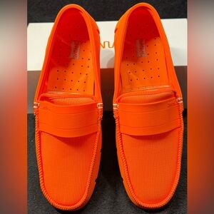 Swims “single stride band” orange slip on shoes. New in box.
